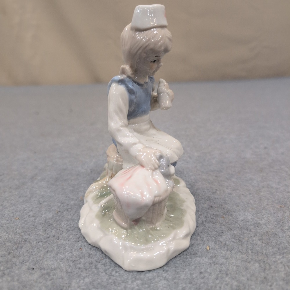 Vintage Porcelain Girl Nurse Figurine with Puppy in Basket Blue and White - Picture 5 of 7